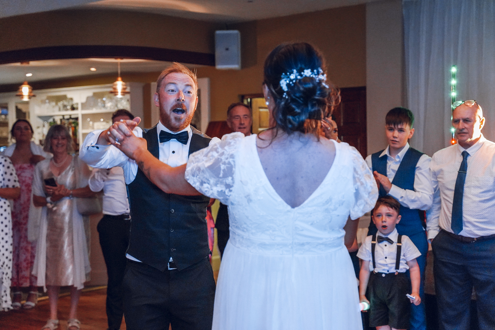 Bride groom dancing in the middle of the dance floor